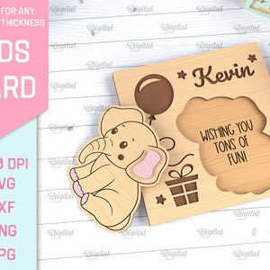 May include: A wooden card with a cut-out elephant design, a balloon, and a gift box. The card is personalized with the name "Kevin" and the message "Wishing you tons of fun!"