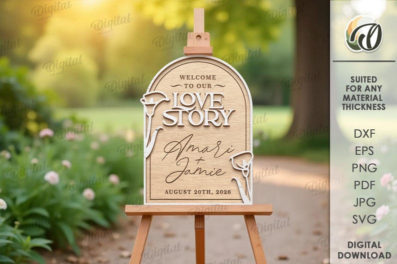 May include: Wooden wedding sign on an easel, featuring the words "Welcome to our Love Story" and the names "Amari & Jamie" with the date August 20th, 2026. The sign has a decorative floral design and is set outdoors.