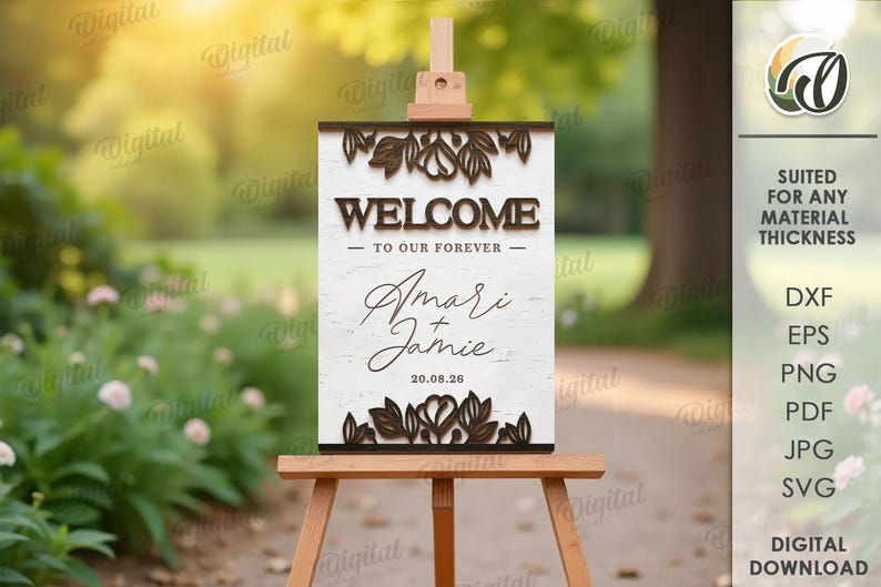 May include: A wooden welcome sign on an easel, featuring the words "WELCOME TO OUR FOREVER" and the names "Amari & Jamie" with the date 20.08.26. The sign has a floral design and is set against a blurred outdoor background.
