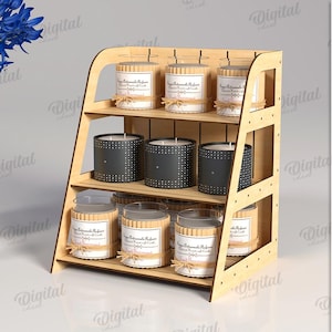 May include: A three-tiered wooden display shelf holding candles in glass jars and black containers. The candles are labeled and decorated with twine. The shelf is made of light-colored wood and has a minimalist design. The material width is 3 mm.
