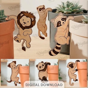 May include: Ten wooden animal designs, including a sloth, cat, lion, ferret, raccoon, lizard, squirrel, dog, panda, and monkey. The designs are suitable for any material thickness and are available as a digital download.