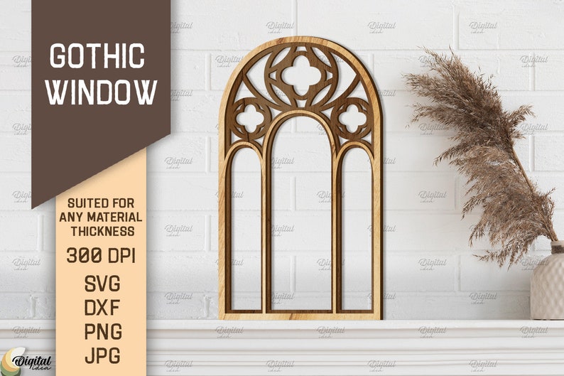 May include: A wooden cutout of a gothic window with a decorative arched top and three vertical panels. The window is on a white brick wall with a brown plant in a white pot.