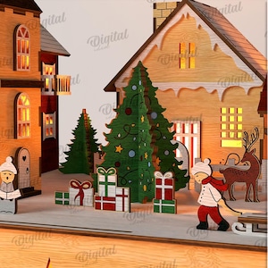 May include: A laser-cut Christmas village scene with buildings, trees, and figures. The scene includes a church with a cross, houses, carolers, a child pulling a sled, and a reindeer. The material width is 3 mm.