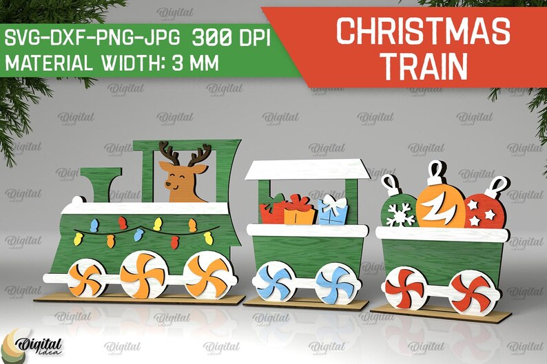 May include: A Christmas train made of wood with a green and white color scheme. The train has three cars, the first car features a reindeer, the second car has presents, and the third car has Christmas ornaments. The train is 3 mm wide.