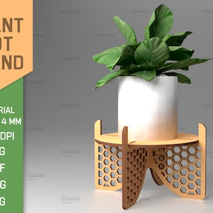 May include: A plant pot stand made of wood with a honeycomb design. The stand is 4 mm thick and is shown with a white pot and a green plant.