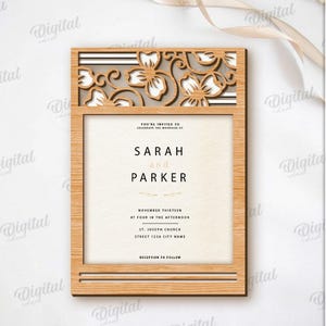 May include: A wooden wedding invitation with a floral laser-cut design at the top. The invitation includes the names "SARAH and PARKER" and event details. The design is suitable for any material thickness and is available for digital download.