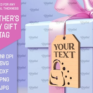May include: A wooden gift tag with a cut-out design of a handbag. The tag is light brown and has the text "YOUR TEXT" in dark brown lettering. The tag is tied with a pink ribbon to a light blue gift box.