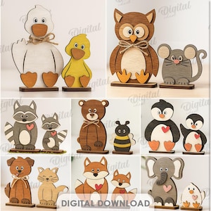 May include: Wooden animal figurines in various designs, including a duck, owl, mouse, raccoon, bear, bee, penguin, dog, cat, fox, and elephant. Each figurine is approximately 3 mm thick and features a heart design. The image also includes the text "8 DESIGNS" and "DIGITAL DOWNLOAD."