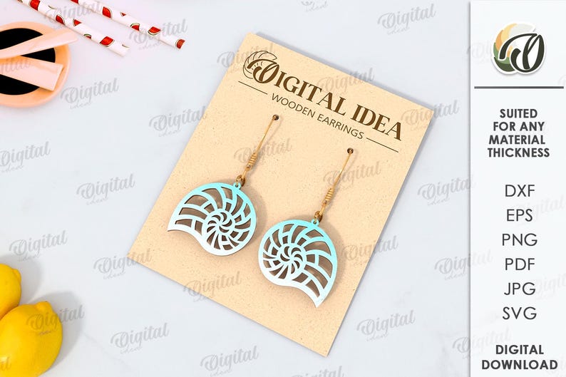 May include: A pair of wooden earrings shaped like seashells with a blue and white gradient design. The earrings are displayed on a card with the text "Digital Idea - Wooden Earrings".
