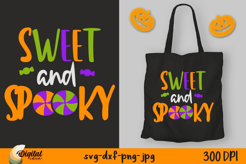 Op de afbeelding: Een zwarte tote bag met de tekst "Sweet and Spooky" in oranje, groene en paarse letters. De tekst wordt omringd door twee snoepspiraalvormen in paars, groen en oranje.