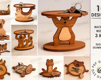 Puede incluir: Una colección de 10 llaveros de madera con diseños de animales, incluyendo un oso, un perro y un gato. Cada soporte tiene una plataforma circular para guardar llaves. Ancho del material: 3 mm. Descarga digital.