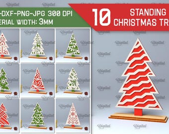 May include: Ten different designs for standing Christmas trees, each with a unique pattern. The trees are made of white paper with red and green accents. The designs include snowflakes, swirls, and stripes. The trees are 3 mm wide and are available in SVG, DXF, PNG, and JPG formats.