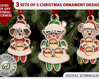 May include: Three sets of five Christmas ornament designs featuring a dog, elf, and bear. Each ornament has a space for a name. The ornaments are made of wood and are suitable for any material thickness.