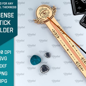 May include: Wooden incense stick holder with an eye and floral design. The holder is light brown with a peach-colored groove for the incense stick. The holder is 300 DPI and available in SVG, DXF, PNG, and JPG formats.