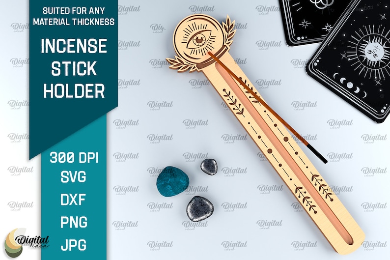 May include: Wooden incense stick holder with an eye and floral design. The holder is light brown with a peach-colored groove for the incense stick. The holder is 300 DPI and available in SVG, DXF, PNG, and JPG formats.