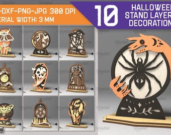 Può includere: Dieci decorazioni per stand a strati a tema Halloween. Ogni stand presenta un design spettrale diverso, tra cui un ragno, un teschio, una falena e un gatto. Gli stand sono in legno e hanno uno spessore di circa 3 mm. SVG-DXF-PNG-JPG 300 DPI.