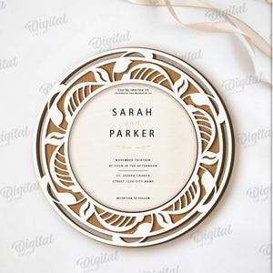 May include: A circular laser-cut wedding invitation with the names "SARAH and PARKER". The invitation includes event details and a decorative border. Suitable for any material thickness. Digital download available.