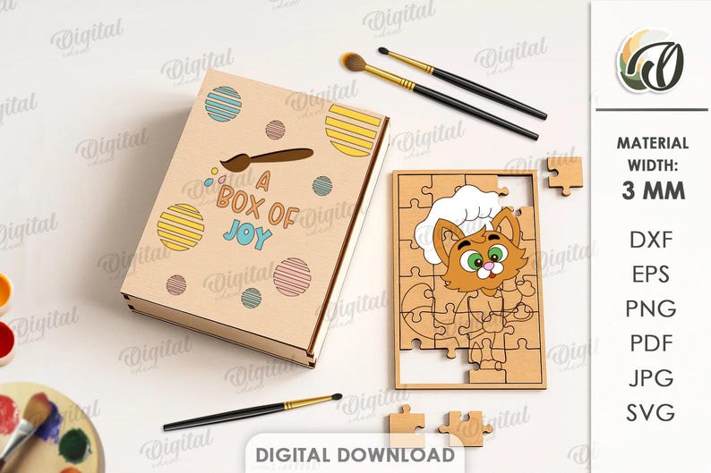 May include: A wooden jigsaw puzzle with a cartoon cat in a chef's hat, and the words "A BOX OF JOY" on the box. The puzzle is partly put together. Paintbrushes and paint are also visible. The material width is 3 mm.