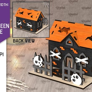 K&ouml;nnte beinhalten: Ein 3D-Halloweenhausmodell mit orangefarbenem Dach und schwarzen W&auml;nden, mit ausgeschnittenen Sternen und Flederm&auml;usen. Das Haus hat einen Zaun mit Totenkopf und gekreuzten Knochen. Der Text lautet "3D Halloween House".