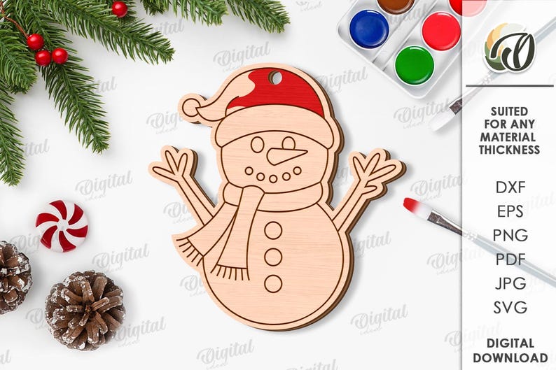 May include: A wooden snowman ornament with a red hat and scarf. The snowman has a smiling face with button eyes and a carrot nose. The ornament is surrounded by Christmas decorations and the text "SUITED FOR ANY MATERIAL THICKNESS".