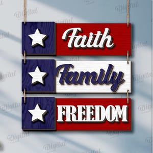 Peut inclure: Panneau en bois avec trois rectangles affichant une &eacute;toile et les mots Foi, Famille et Libert&eacute;. Les panneaux sont rouges, blancs et bleus, avec un design rustique et des options de t&eacute;l&eacute;chargement num&eacute;rique.
