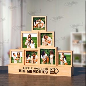 Peut inclure: Un cadre photo en bois avec un design à plusieurs niveaux, contenant plusieurs photos de familles. Le cadre a une plaque qui indique "Little Moments Big Memories".
