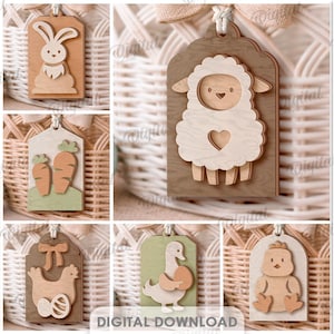 Peut inclure: Une collection de dix motifs en bois sur le thème de Pâques, dont un lapin, un agneau, un canard et un poussin, chacun sur une étiquette. Les motifs sont de couleurs et de styles variés. Le texte "TÉLÉCHARGEMENT NUMÉRIQUE" est visible. L'image comprend également le texte "10 MOTIFS" et "ADAPTÉ À TOUTE ÉPAISSEUR DE MATÉRIAU".