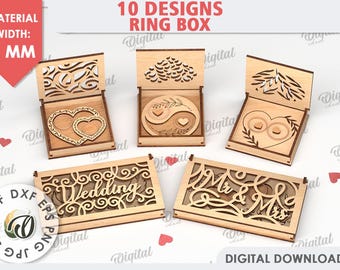 May include: A collection of laser-cut wooden ring boxes with various designs, including hearts, wedding-themed text, and a yin-yang symbol. The boxes are open, showcasing the interior details. The text "10 DESIGNS RING BOX" is visible.