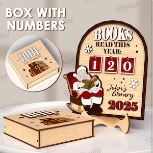 May include: Wooden box with the text "BOX WITH NUMBERS" and a smaller box with "BOH FOR NUMBERS" on top. A wooden sign with "BOOKS READ THIS YEAR: 120" and Santa Claus reading a book. The sign says "John's library 2025".