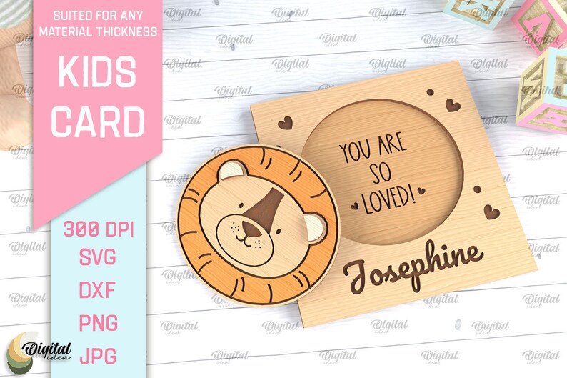 May include: A wooden card with a lion face and the text "You are so loved! Josephine" in a circle. The card is designed for laser cutting.