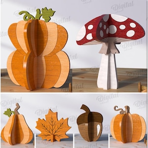 May include: A collection of 10 wooden fall-themed designs, including a pear, apple, mushroom, pumpkin, acorn, and leaf. The designs are made of 3 mm thick material. The image also includes the text "DIGITAL DOWNLOAD".