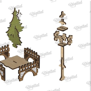 May include: Laser-cut wooden Christmas village components. Includes a green Christmas tree with a star, a table with a fence, and a street lamp. The material width is 3 mm.