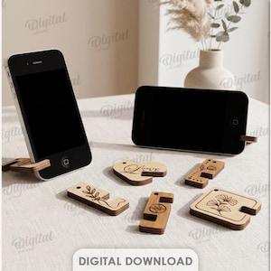 May include: Wooden phone stands in various shapes, including hearts and squares, with engraved designs and text. Two black smartphones are displayed on stands. The image also shows the text "10 DESIGNS" and "DIGITAL DOWNLOAD".