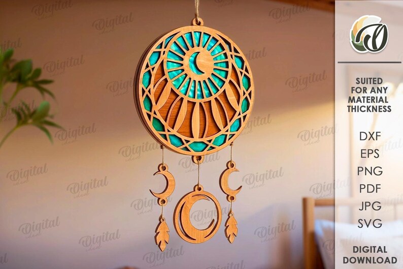Peut inclure: Un attrape-r&ecirc;ves en bois avec un design circulaire, pr&eacute;sentant une palette de couleurs turquoise et marron. L'attrape-r&ecirc;ves comporte des pendentifs en forme de croissant de lune et de plumes. Le texte "SUITED FOR ANY MATERIAL THICKNESS" est visible.