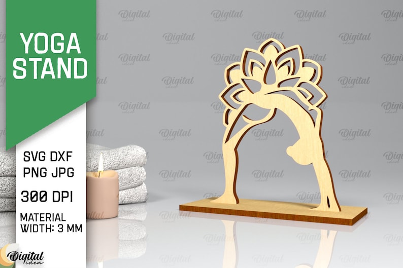 Peut inclure: Une d&eacute;coupe en bois d'une pose de yoga avec un motif de fleur de lotus. La d&eacute;coupe a une &eacute;paisseur de 3 mm et est con&ccedil;ue pour la d&eacute;coupe au laser. L'image comprend le texte "YOGA STAND" et "SVG DXF PNG JPG 300 DPI MATERIAL WIDTH: 3 MM".