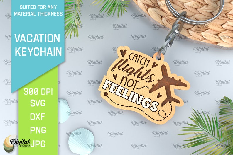 May include: Wooden keychain with the text "Catch flights not feelings" and a small airplane design. The keychain is brown with white text and is attached to a silver key ring.