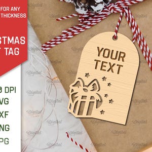 May include: A wooden Christmas gift tag with a cutout design of a present and stars. The tag is blank and says "Your Text" at the top.