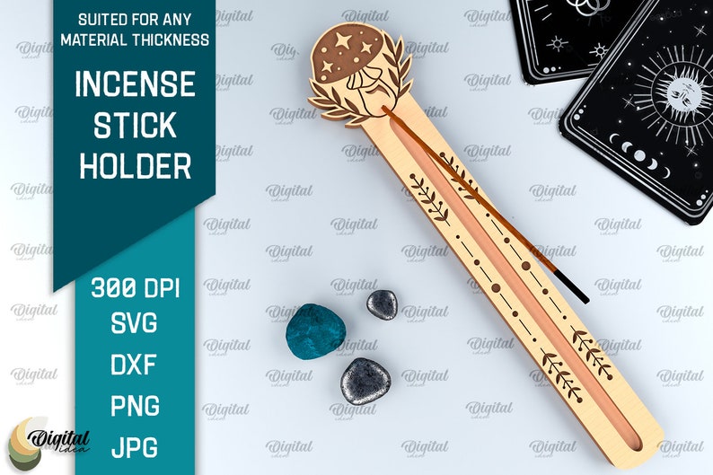 May include: Wooden incense stick holder with a mushroom design. The holder has a groove for the incense stick and a decorative design of leaves and dots. The mushroom has a starry design.