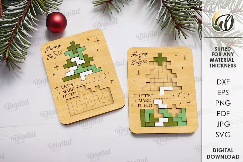 May include: Two wooden Christmas tree puzzles with the text "Merry & Bright" and "Let's Make It Fit!". The trees are made of green and white geometric shapes. A red ornament and pine branches are in the background.