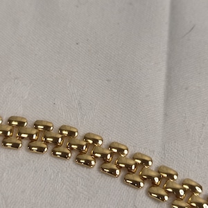 Elegant narrow carpet bracelet in gold high quality