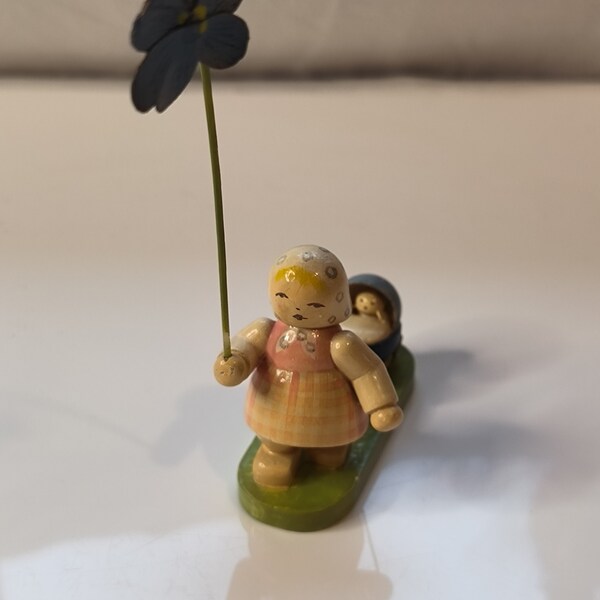 Flower child girl with headscarf pansies and stroller Wendt and Kühn Erzgebirge