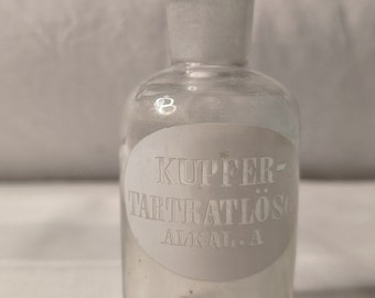 1900 "Copper tartra solution" apothecary bottle with glass enamel lid