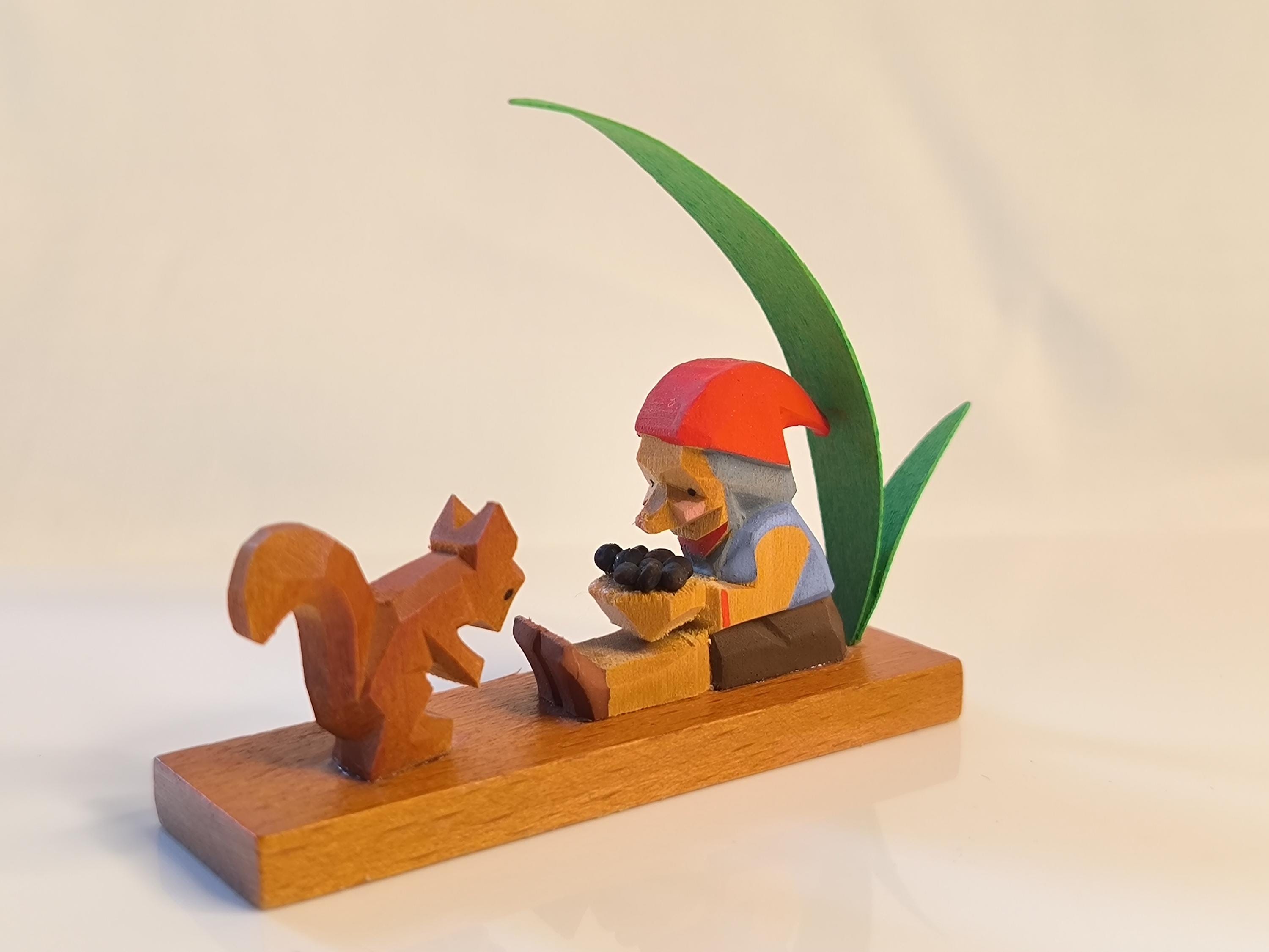 Emil Helbig linden wood hand-carved hand-painted figure "Dwarf with squirrel and nuts"