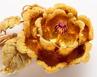 Broche fleur vintage en or 18 carats