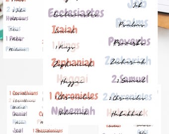 May include: Bible header printables with various book titles in a handwritten style. The titles are in different colors, including pink, purple, and black. The text "PDF-STANDARD" is at the bottom.