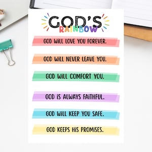 May include: A white printable featuring the text "BIBLE PRINTABLES" at the top. Below, the words "GOD'S RAINBOW" are displayed with colorful accents. The printable includes inspirational phrases like "GOD WILL LOVE YOU FOREVER."
