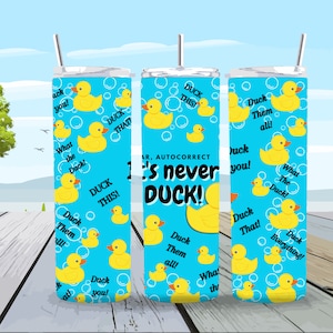 May include: Three stainless steel tumblers with a blue background and yellow rubber ducks. The tumblers have different phrases on them, including "Duck This!" and "It's never duck!"