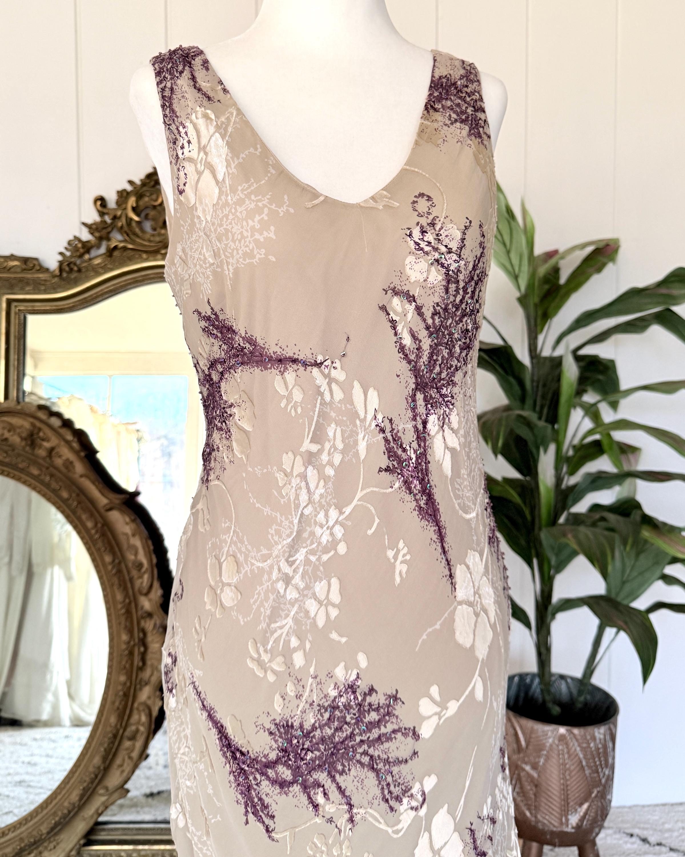 bias cut silk sequin dress SS'26 Bias-cut slip dress in ivory sequins with a draped cowl neckline and  fine straps. Tailored darts sculpt and define the body, while the liquid  sequin surface catches the light, shaping a