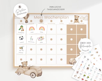 May include: A weekly planner board with a light wood frame, featuring a teddy bear in a car and a hot air balloon illustration. The grid includes German text labels for days of the week, circular markers, and a set of over 300 routine cards.