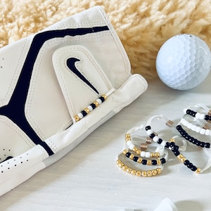 Gants de golf Compteurs de coups / À l'unité : séries or, noir et blanc / Compteur de coups de golf discret / 10 perles, cordon en nylon et élastique